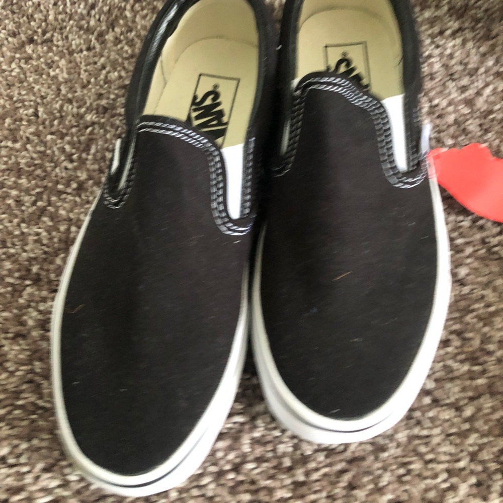 brand new black slip on vans